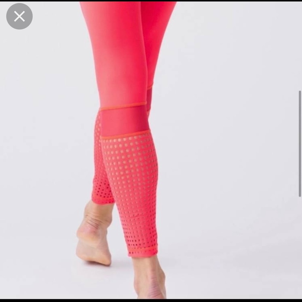Zyia Pink/coral tights. Size 4. With cute details around calves